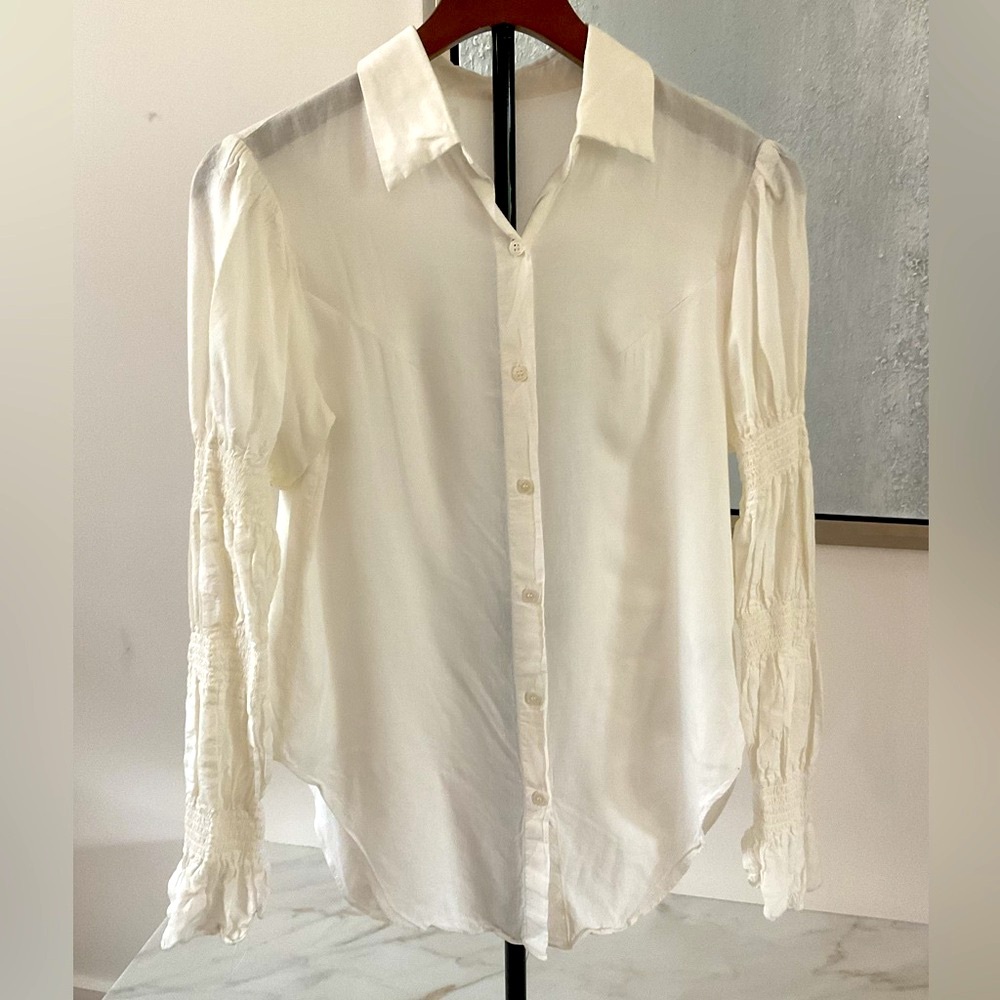 Chic Off White Button-Down Shirt with Statement Sleeves .